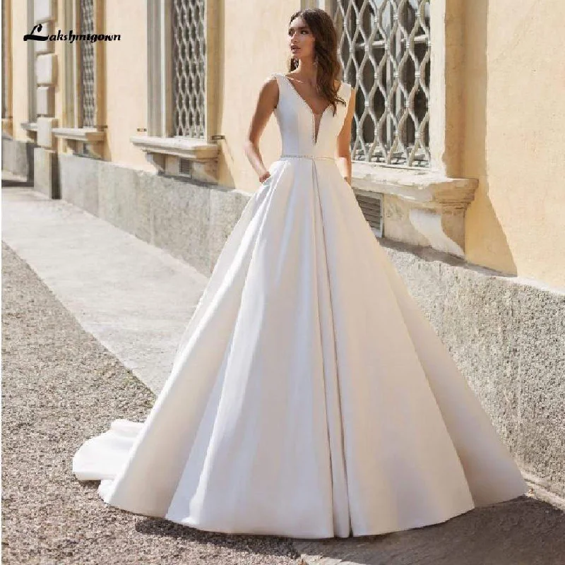 women's statement dressesRoycebridal Elegant A Line V Neck Satin Wedding Dresses with Pockets